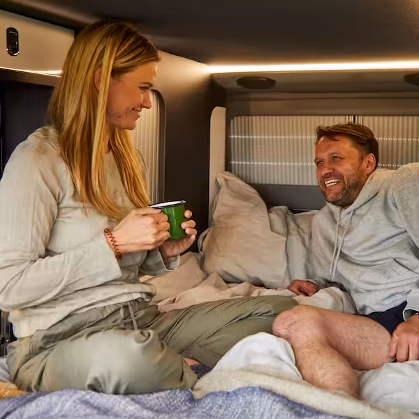 2026 Monza Couple On Bed Swift Campervans