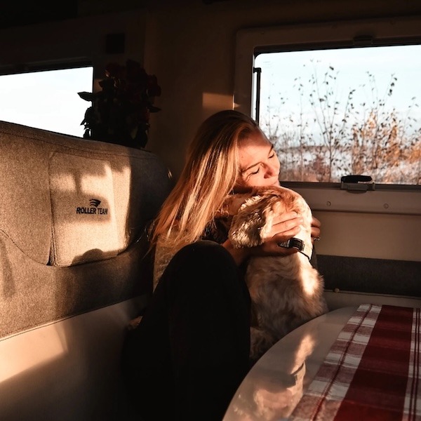 2026 Roller Team Woman Hugging Dog