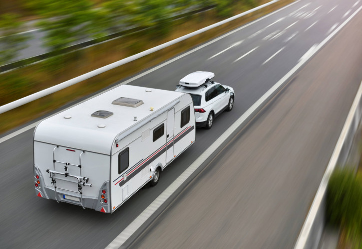 caravan driving on the road